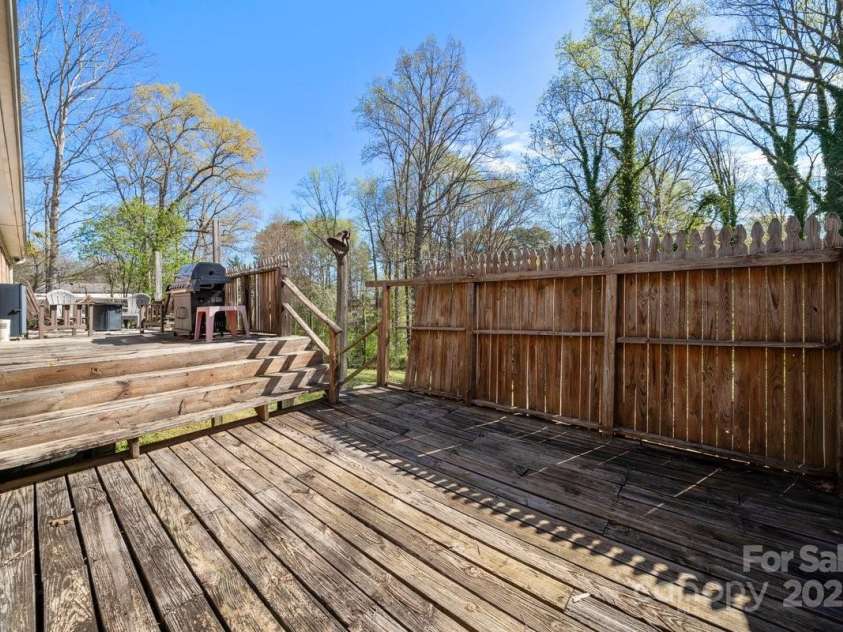 129 Saddle Road, Mooresville, NC 28115.  MLS# CAR4238145, YatesRealty ID 18386. Back deck