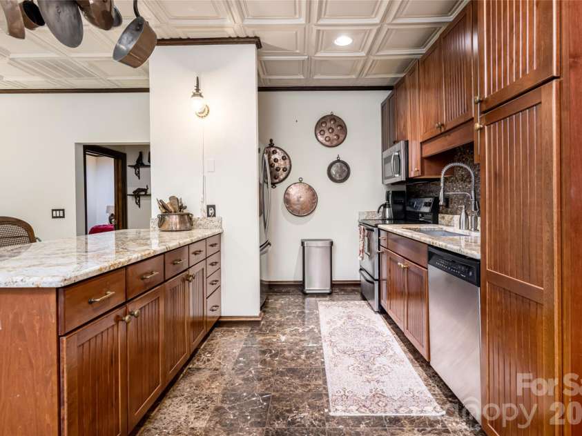 14 Walnut Drive, Mills River, NC 28759.  MLS# CAR4368399, YatesRealty ID 18386. Basement Apartment