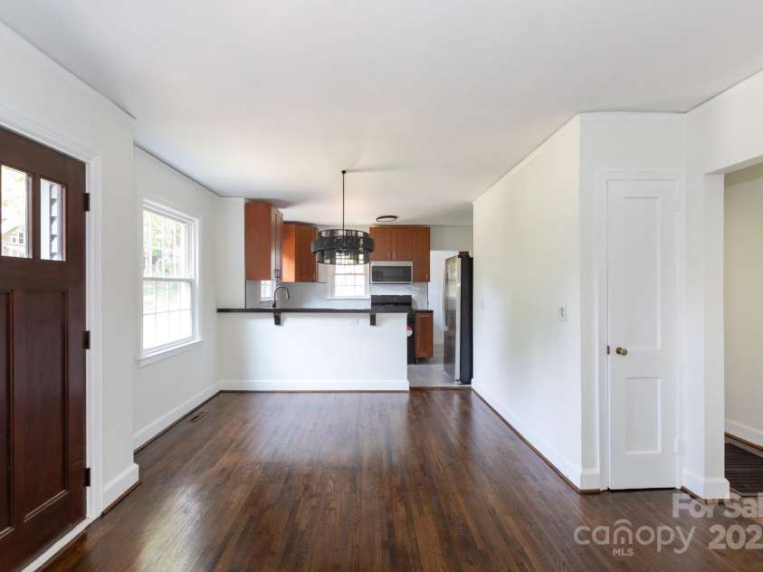 2628 Clydesdale Terrace, Charlotte, NC 28208.  MLS# CAR4267702, YatesRealty ID 18388. Dining Area with kitchen behind.