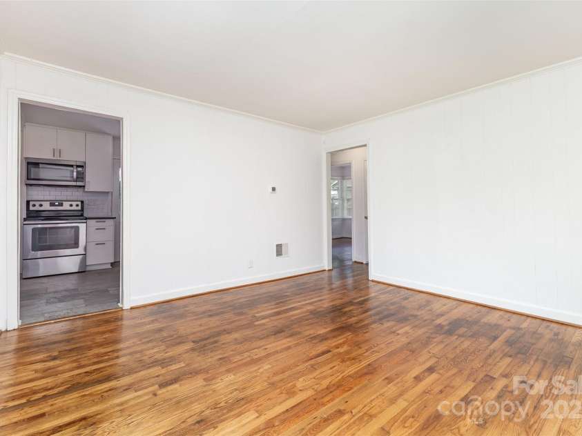 2819 Georgia Avenue, Charlotte, NC 28205.  MLS# CAR4266424, YatesRealty ID 18393. Main into the kitchen.