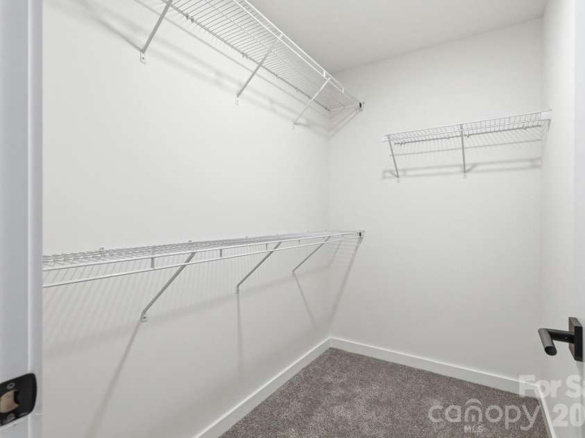 274 Bellhaven Place, Concord, NC 28027.  MLS# CAR4369397, YatesRealty ID 18399. Primary Bedroom's Walk-in Closet