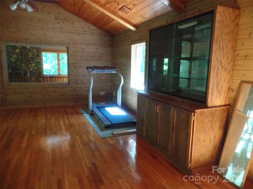 721 Kuenzel Eller Drive, Millers Creek, NC 28651.  MLS# CAR4179124, YatesRealty ID 184. Upper level Bedroom/Exercise Room Furniture and Equipment will reamin