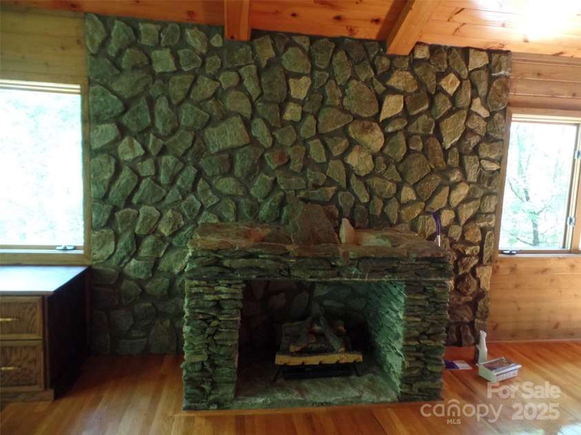 721 Kuenzel Eller Drive, Millers Creek, NC 28651.  MLS# CAR4179124, YatesRealty ID 184. Upper Level Office and Stone Gas Fireplace