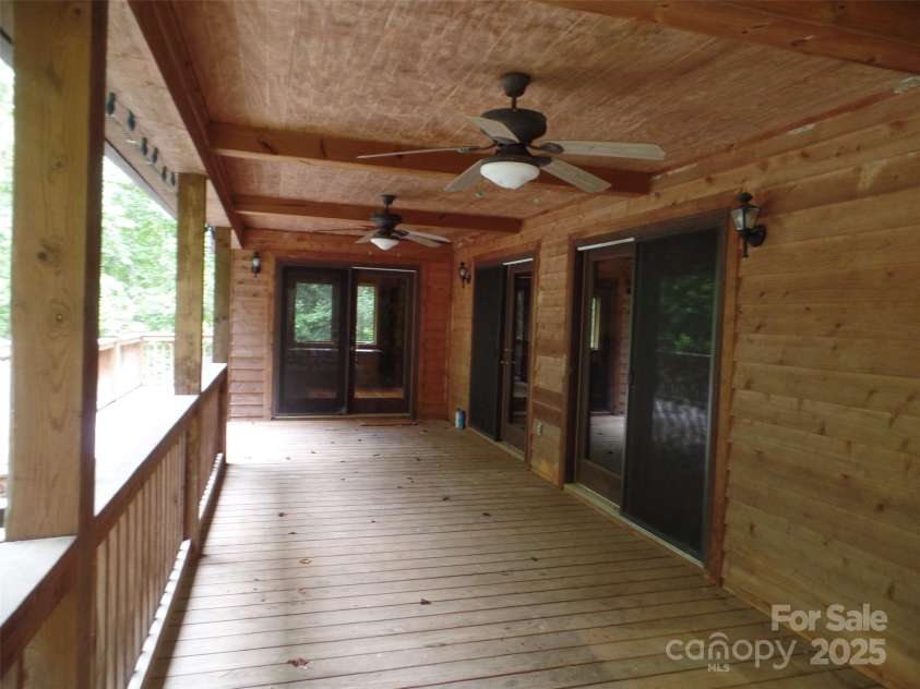 721 Kuenzel Eller Drive, Millers Creek, NC 28651.  MLS# CAR4179124, YatesRealty ID 184. View of upper level deck outside Exercise/Bedroom and Office