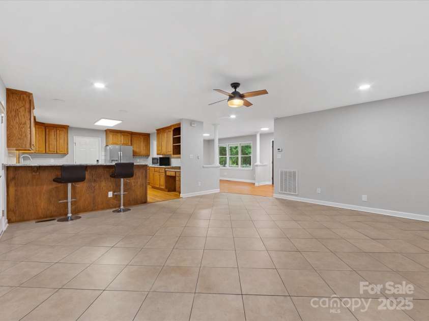 5322 Bridgeview Drive, Iron Station, NC 28080.  MLS# CAR4268245, YatesRealty ID 18401. Family Room/Kitchen