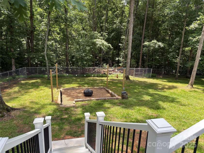 5322 Bridgeview Drive, Iron Station, NC 28080.  MLS# CAR4268245, YatesRealty ID 18401. Fire Pit