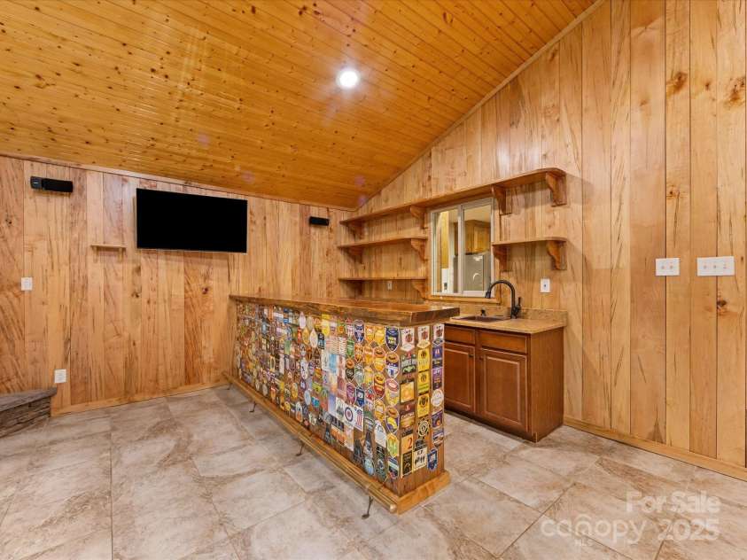 5322 Bridgeview Drive, Iron Station, NC 28080.  MLS# CAR4268245, YatesRealty ID 18401. Great Room Bar