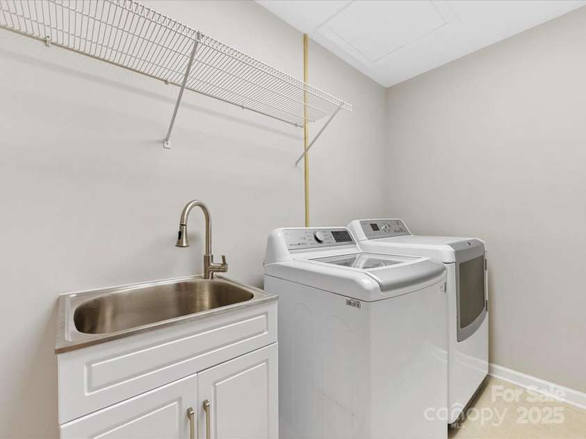 5322 Bridgeview Drive, Iron Station, NC 28080.  MLS# CAR4268245, YatesRealty ID 18401. Laundry Room with sink