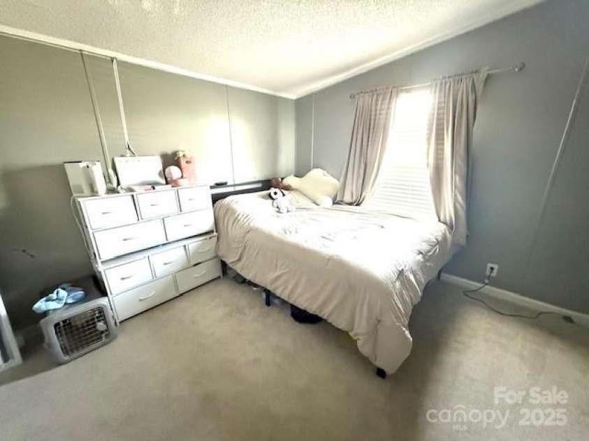 161 Hickory Nut Drive, Statesville, NC 28677.  MLS# CAR4245428, YatesRealty ID 18405. 