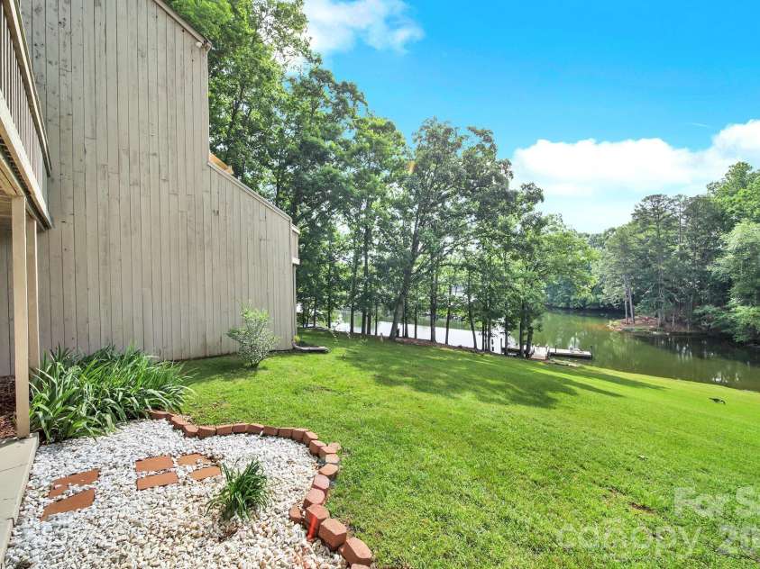 58 Ridgeport Road, Clover, SC 29710.  MLS# CAR4376847, YatesRealty ID 18405. Just a walk or view from the lake and shared dock