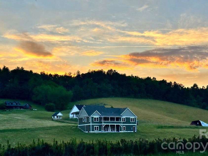 1060 California Creek Road, Mars Hill, NC 28754.  MLS# CAR4377594, YatesRealty ID 18407. Backyard