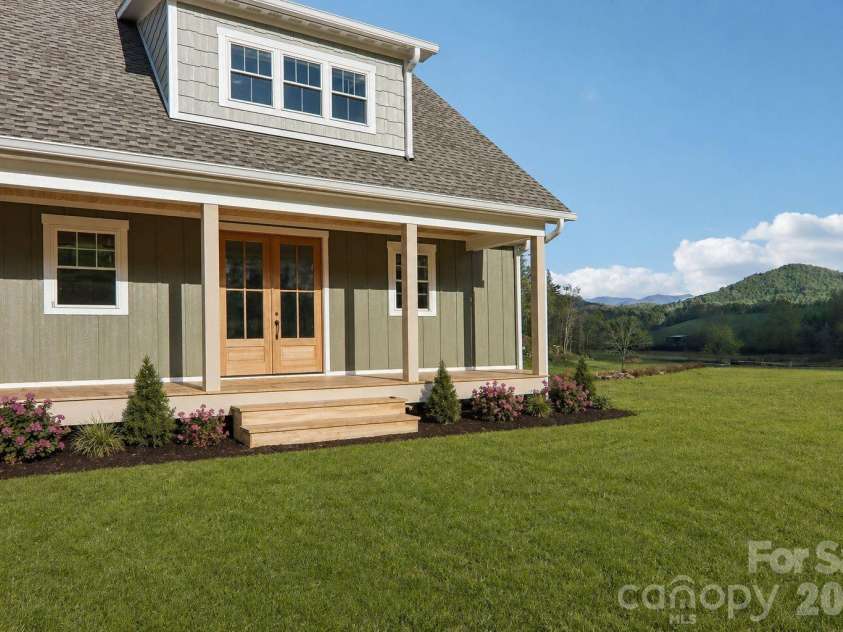 1060 California Creek Road, Mars Hill, NC 28754.  MLS# CAR4377594, YatesRealty ID 18407. Front View Virtually Staged