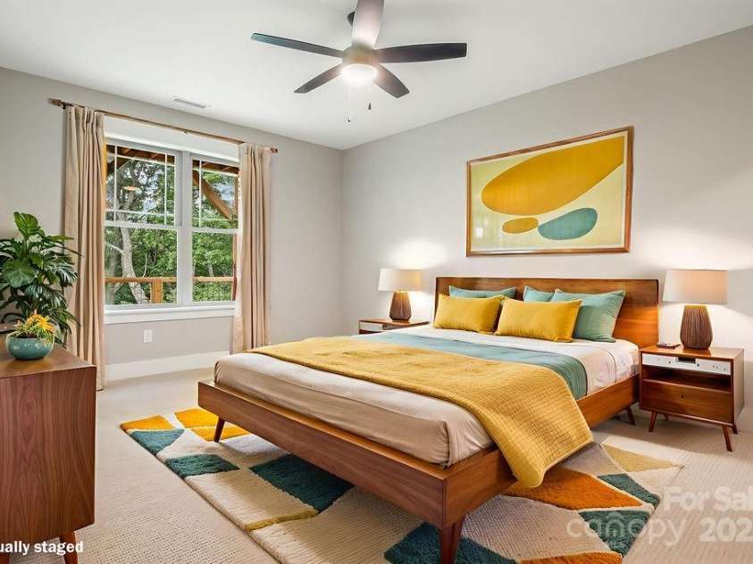 21 Craftsman Overlook Ridge, Arden, NC 28704.  MLS# CAR4007643, YatesRealty ID 18407. Lower level 3rd bedroom with ceiling fan and walk-in closet.