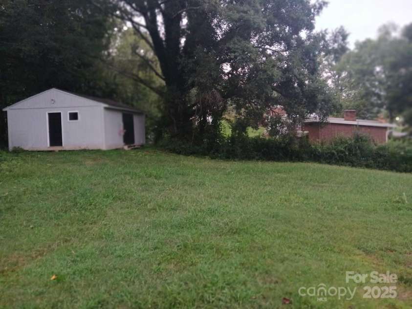 105 Inman Avenue, Bessemer City, NC 28016.  MLS# CAR4219453, YatesRealty ID 18408. 