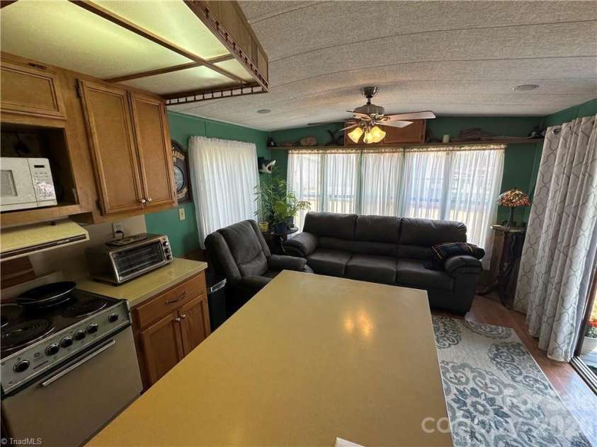 120 Elm Street, New London, NC 28127.  MLS# CAR4373612, YatesRealty ID 18408. 
