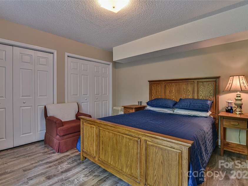 145 Fox Glen Drive, Arden, NC 28704.  MLS# CAR4134713, YatesRealty ID 18409. Bedroom with large closets in apartment