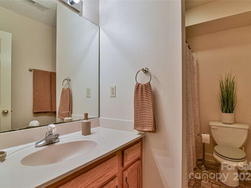 145 Fox Glen Drive, Arden, NC 28704.  MLS# CAR4134713, YatesRealty ID 18409. Full bathroom in basement apartment