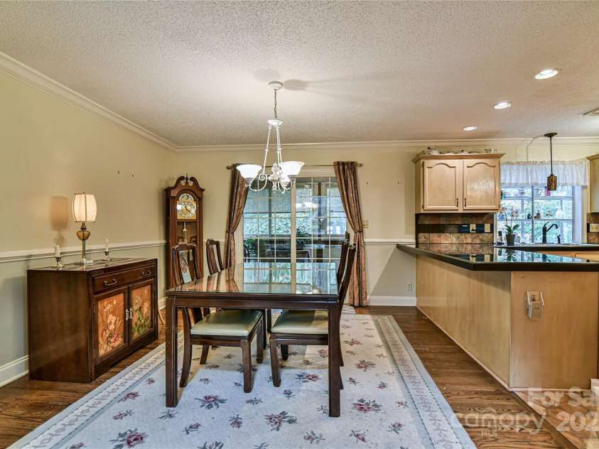 145 Fox Glen Drive, Arden, NC 28704.  MLS# CAR4134713, YatesRealty ID 18409. Main level dining room