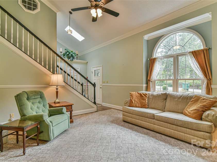 145 Fox Glen Drive, Arden, NC 28704.  MLS# CAR4134713, YatesRealty ID 18409. Main level living room