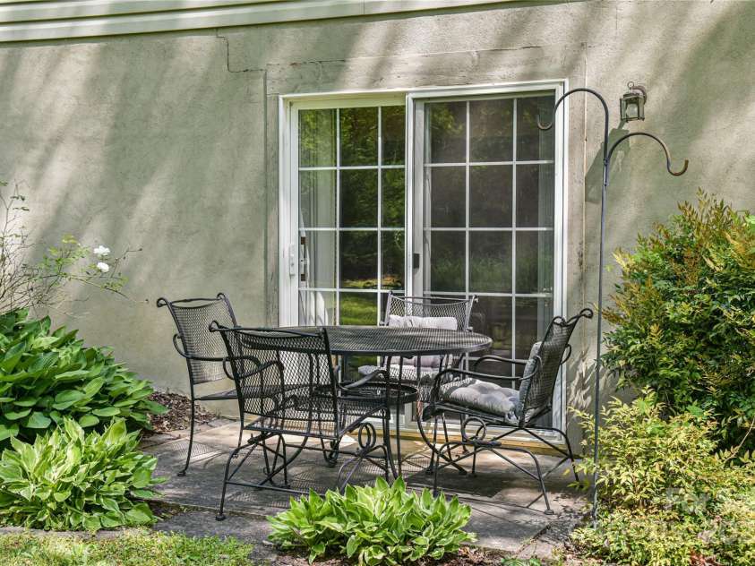 145 Fox Glen Drive, Arden, NC 28704.  MLS# CAR4134713, YatesRealty ID 18409. Second patio off of bedroom in basement apartment.
