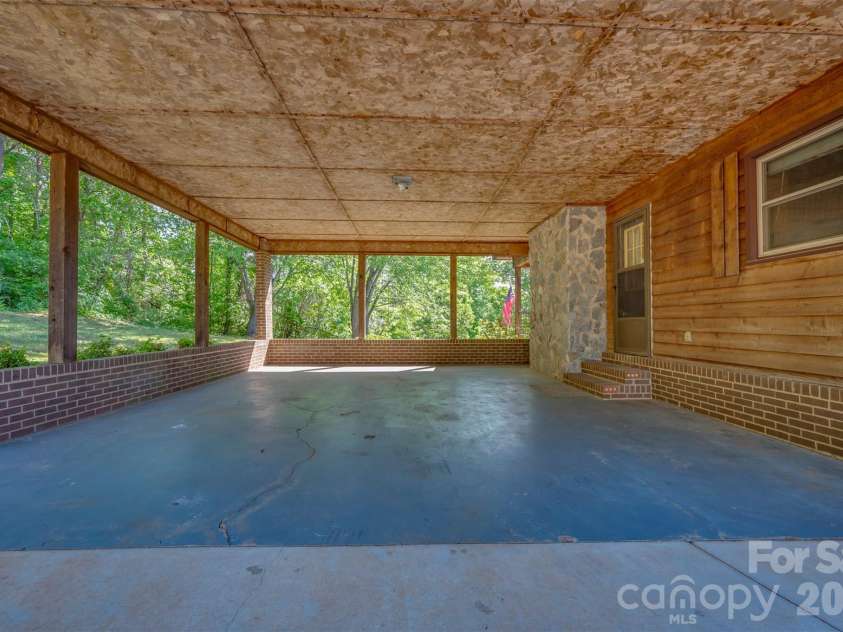 184 Clelo Drive, Casar, NC 28020.  MLS# CAR4375194, YatesRealty ID 18410. Carport