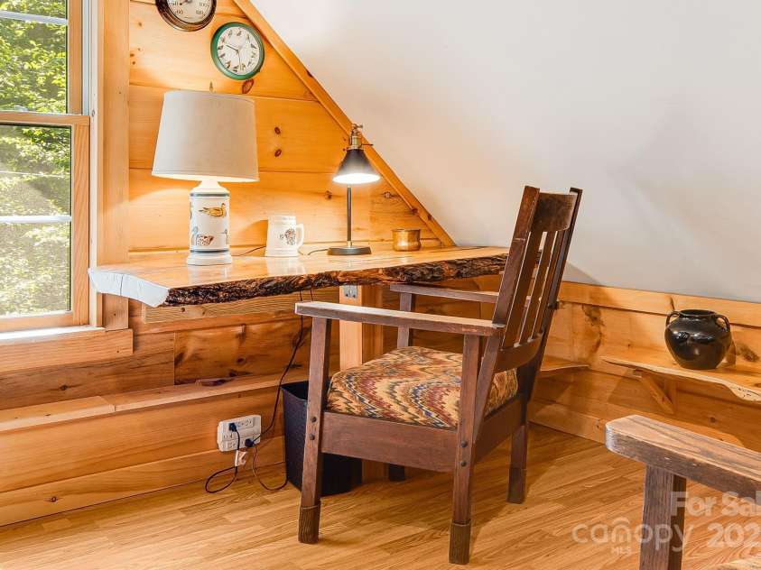 482 Pheasant Street, Lake Lure, NC 28746.  MLS# CAR4253575, YatesRealty ID 18417. Built in desk in Loft