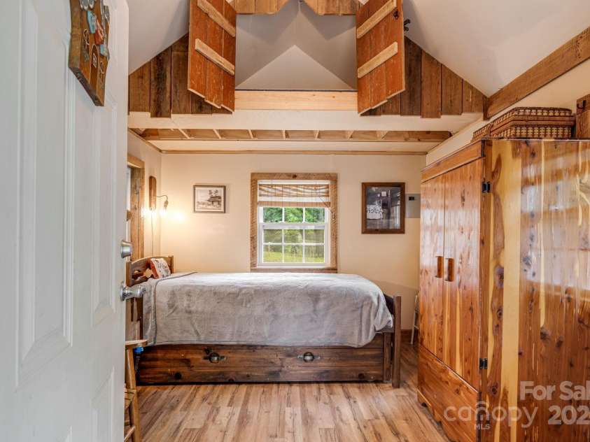 482 Pheasant Street, Lake Lure, NC 28746.  MLS# CAR4253575, YatesRealty ID 18417. Bunky-Finished  Interior Trundle Bed and Cedar Armoire Included
