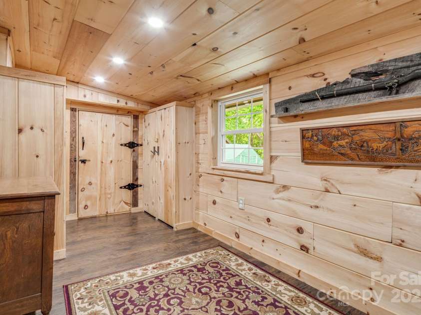 482 Pheasant Street, Lake Lure, NC 28746.  MLS# CAR4253575, YatesRealty ID 18417. Main Level Bedroom