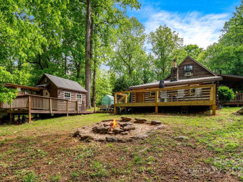 482 Pheasant Street, Lake Lure, NC 28746.  MLS# CAR4253575, YatesRealty ID 18417. Rear View with 12x10 Bunky