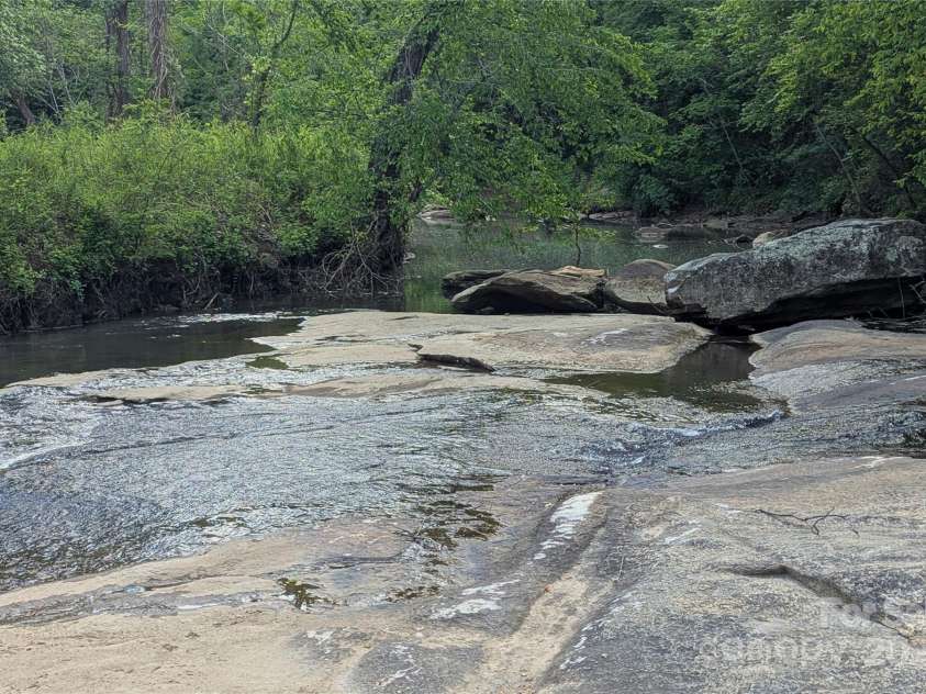 482 Pheasant Street, Lake Lure, NC 28746.  MLS# CAR4253575, YatesRealty ID 18417. Rocky Broad River