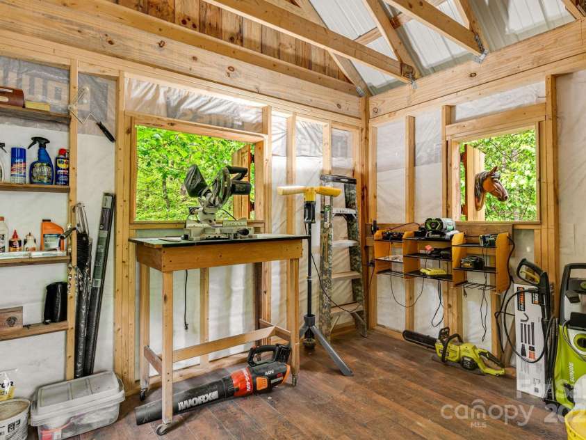 482 Pheasant Street, Lake Lure, NC 28746.  MLS# CAR4253575, YatesRealty ID 18417. Tool Room in Pole Barn Many tools Included