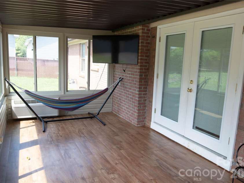 100 Woodward Avenue, Morganton, NC 28655.  MLS# CAR4375619, YatesRealty ID 18418. Sunroom