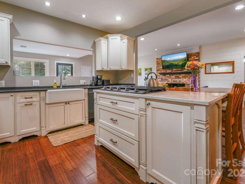 1360 Glen Cannon Drive, Pisgah Forest, NC 28768.  MLS# CAR4252378, YatesRealty ID 18419. Kitchen on Upper Main Level