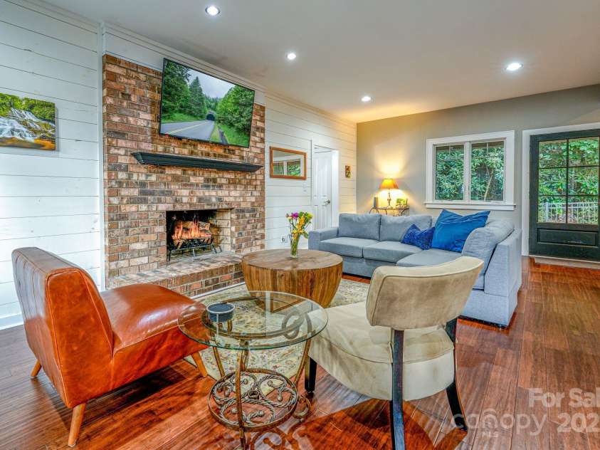 1360 Glen Cannon Drive, Pisgah Forest, NC 28768.  MLS# CAR4252378, YatesRealty ID 18419. Livingroom