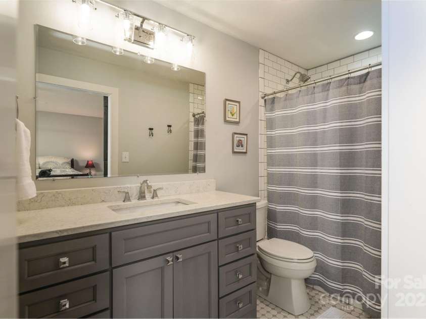 1360 Glen Cannon Drive, Pisgah Forest, NC 28768.  MLS# CAR4252378, YatesRealty ID 18419. Primary Bathroom