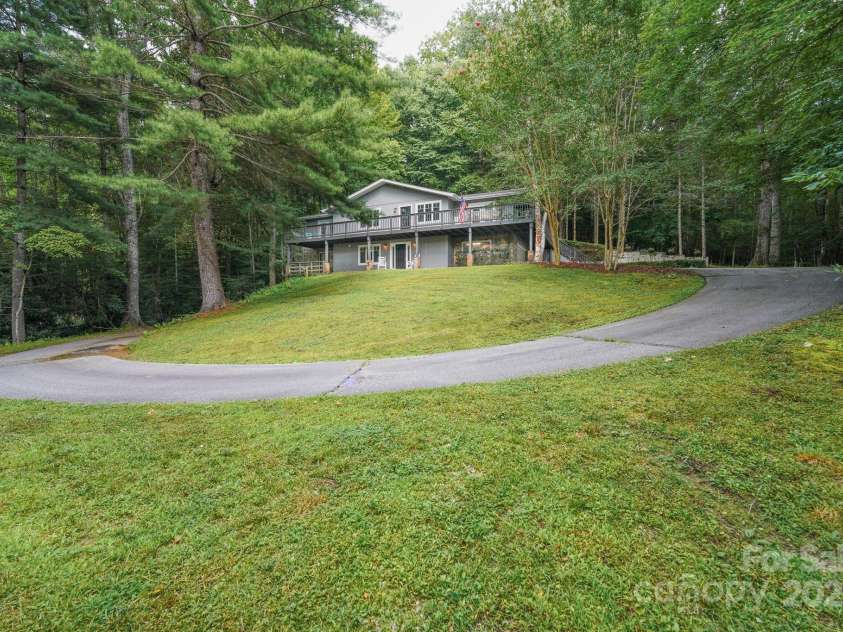 1360 Glen Cannon Drive, Pisgah Forest, NC 28768.  MLS# CAR4252378, YatesRealty ID 18419. Stunning Approach
