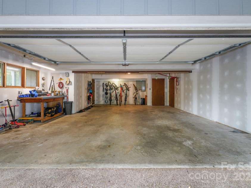 1360 Glen Cannon Drive, Pisgah Forest, NC 28768.  MLS# CAR4252378, YatesRealty ID 18419. Two car Garage