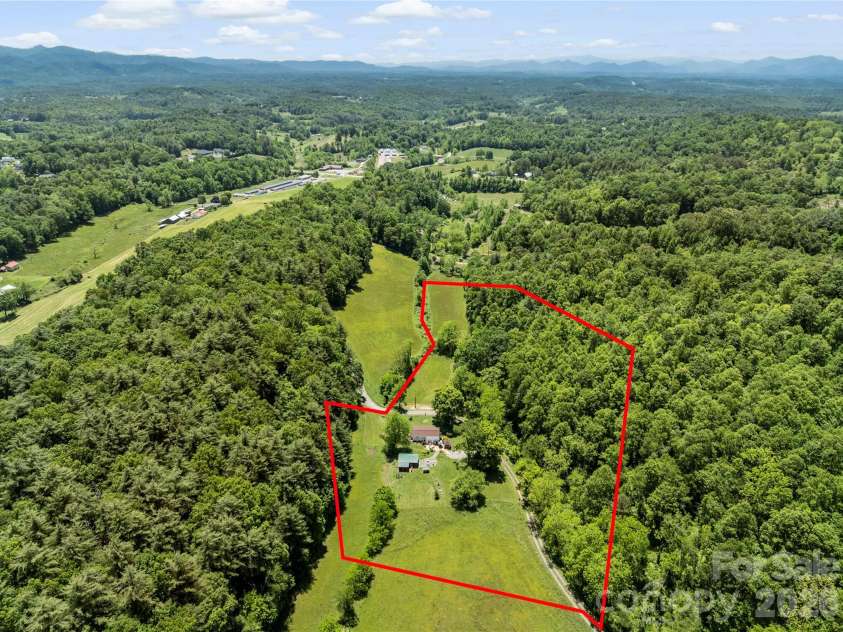 514 Roy Forrester Road, Mars Hill, NC 28754.  MLS# CAR4367162, YatesRealty ID 18420. Aerial Back View with Property Line