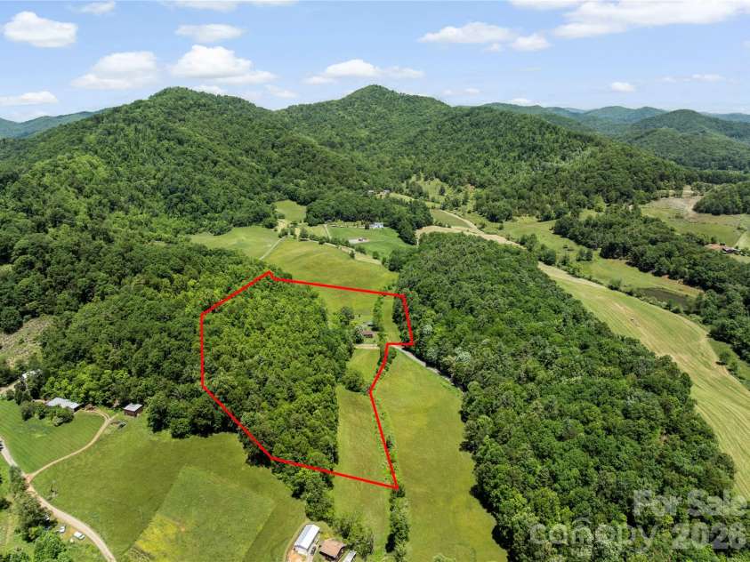 514 Roy Forrester Road, Mars Hill, NC 28754.  MLS# CAR4367162, YatesRealty ID 18420. Aerial Front View with Property Line