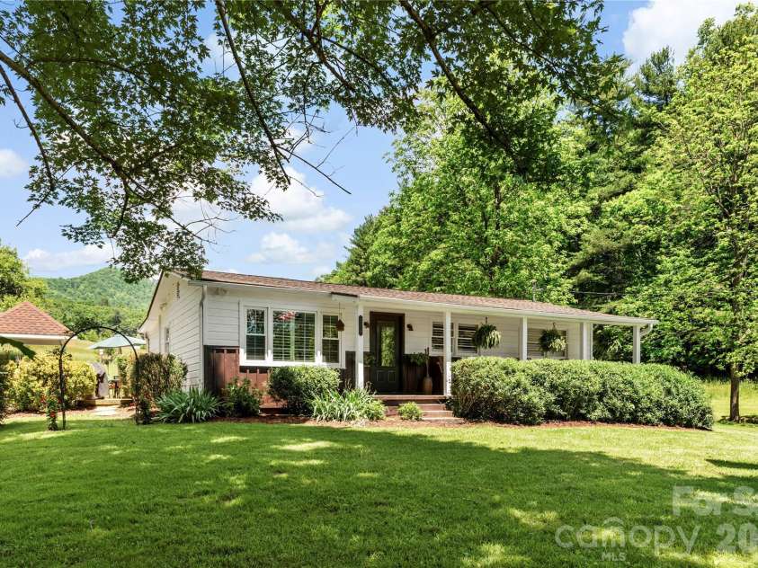 514 Roy Forrester Road, Mars Hill, NC 28754.  MLS# CAR4367162, YatesRealty ID 18420. Home Front and Left Side