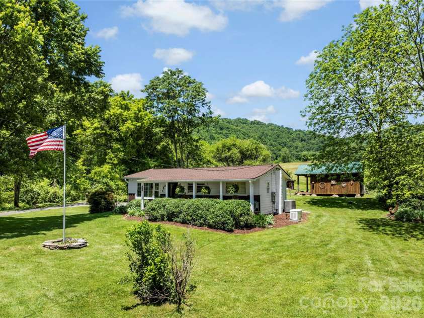 514 Roy Forrester Road, Mars Hill, NC 28754.  MLS# CAR4367162, YatesRealty ID 18420. Home Front and Right Side