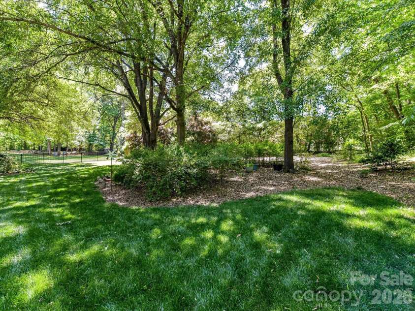 1531 Hansom Lane, Concord, NC 28027.  MLS# CAR4375701, YatesRealty ID 18428. Beautiful Private Back Yard