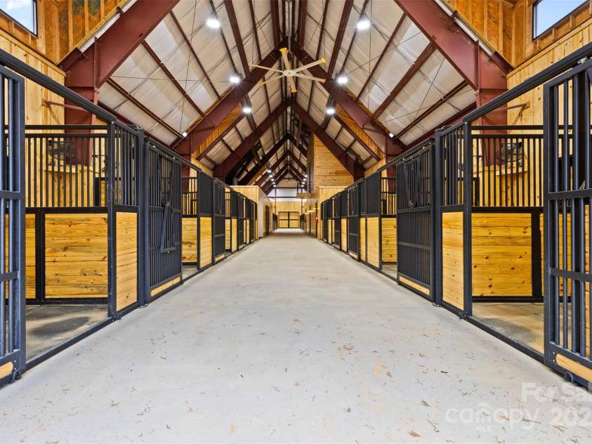 1822 Irby Road, Monroe, NC 28112.  MLS# CAR4259856, YatesRealty ID 1843. 20 Stall Barn with Caretaker Apartment Above 