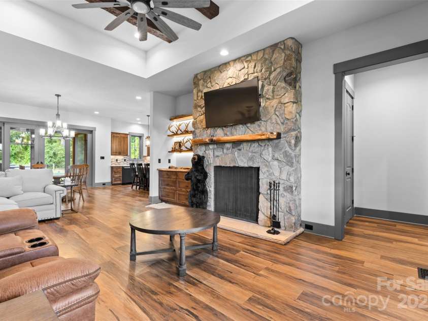 1822 Irby Road, Monroe, NC 28112.  MLS# CAR4259856, YatesRealty ID 1843. Guest Home living Room with Stone Fireplace 