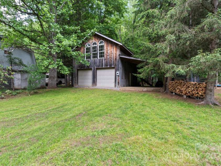 23 Mountain Meadow Lane, Canton, NC 28716.  MLS# CAR4269164, YatesRealty ID 18435. Detached 2 car garage/shop/storage w/potential apartment above