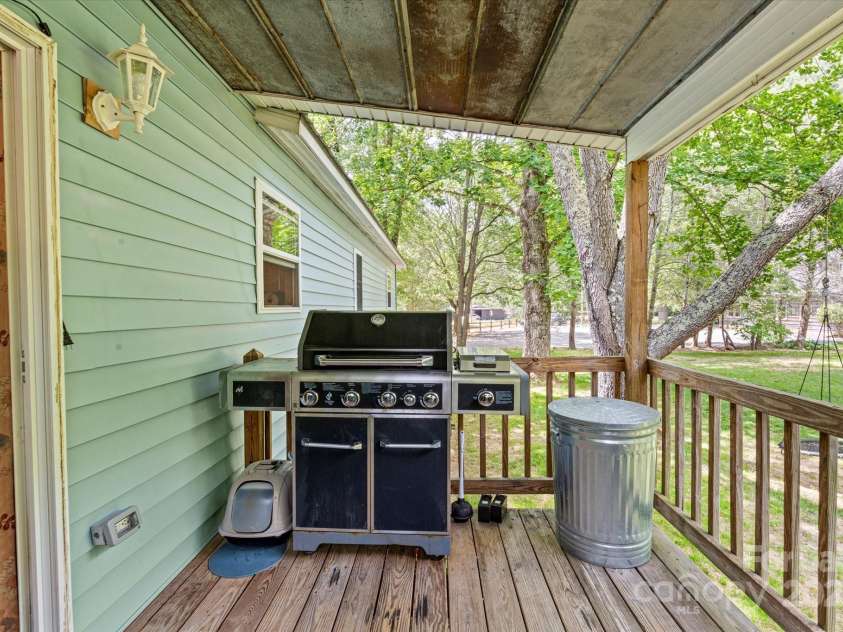 23 Mountain Meadow Lane, Canton, NC 28716.  MLS# CAR4269164, YatesRealty ID 18435. Rear deck overlooks private backyard. Another great entertaining area!