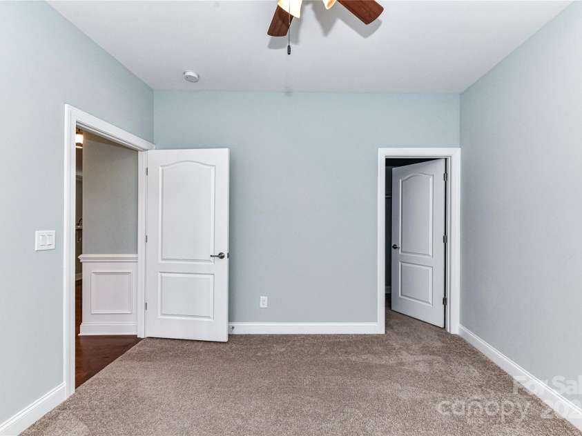 11123 Bailey Park Nature Drive, Cornelius, NC 28031.  MLS# CAR4247952, YatesRealty ID 18437. Bedroom 2 with ceiling fan/light!