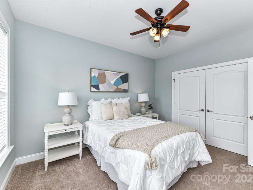 11123 Bailey Park Nature Drive, Cornelius, NC 28031.  MLS# CAR4247952, YatesRealty ID 18437. Bedroom 3 with ceiling fan/light!