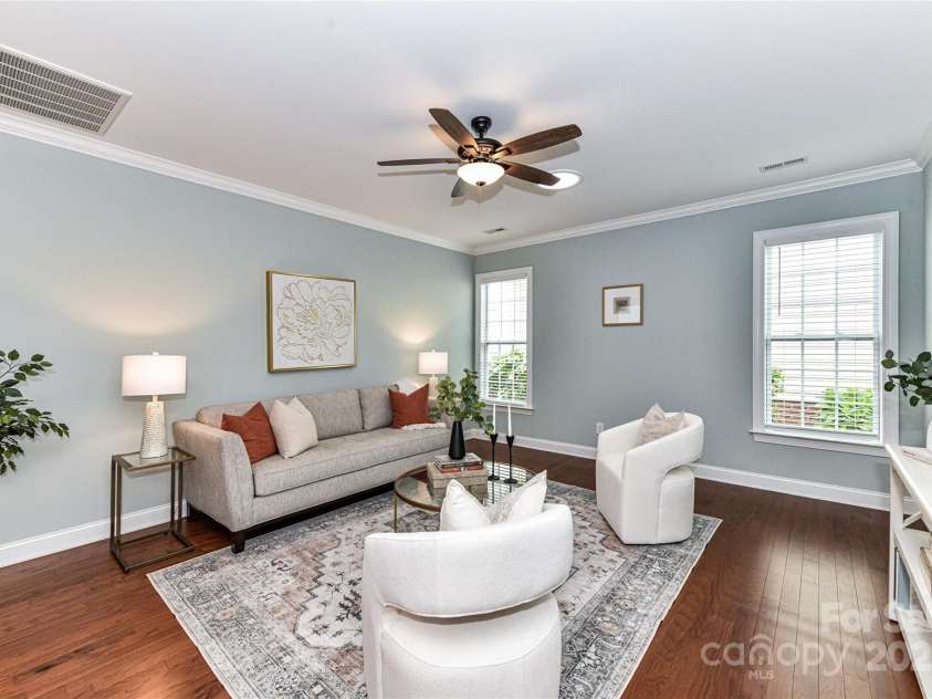 11123 Bailey Park Nature Drive, Cornelius, NC 28031.  MLS# CAR4247952, YatesRealty ID 18437. Great Room features crown molding & ceiling fan with light!