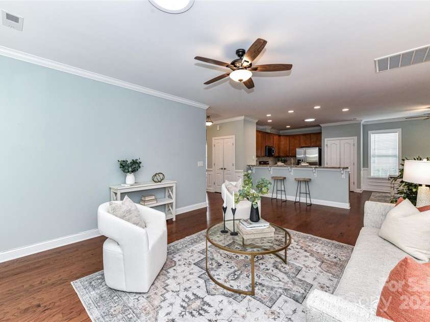 11123 Bailey Park Nature Drive, Cornelius, NC 28031.  MLS# CAR4247952, YatesRealty ID 18437. Great Room features crown molding & ceiling fan with light!